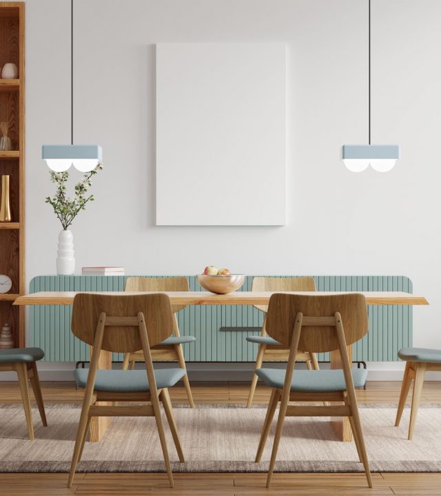 Mock up poster in modern dining room interior design with white empty wall.3d rendering